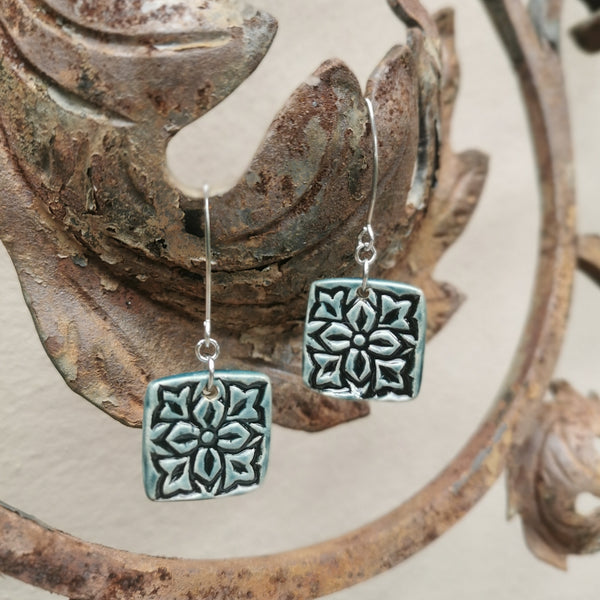 Handmade ceramic earrings, special surface and brilliant greenish blue