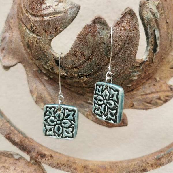 Handmade ceramic earrings, special surface and brilliant greenish blue