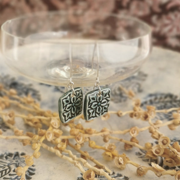 Handmade ceramic earrings, special surface and brilliant greenish blue