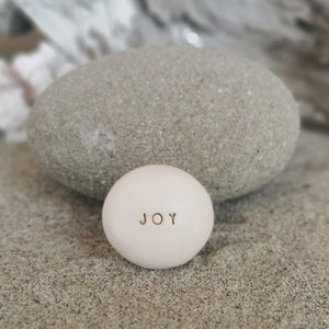 JOY - Motivational message ceramic pebble