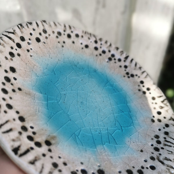 Turquoise ceramic bowl with beautiful cracked glaze