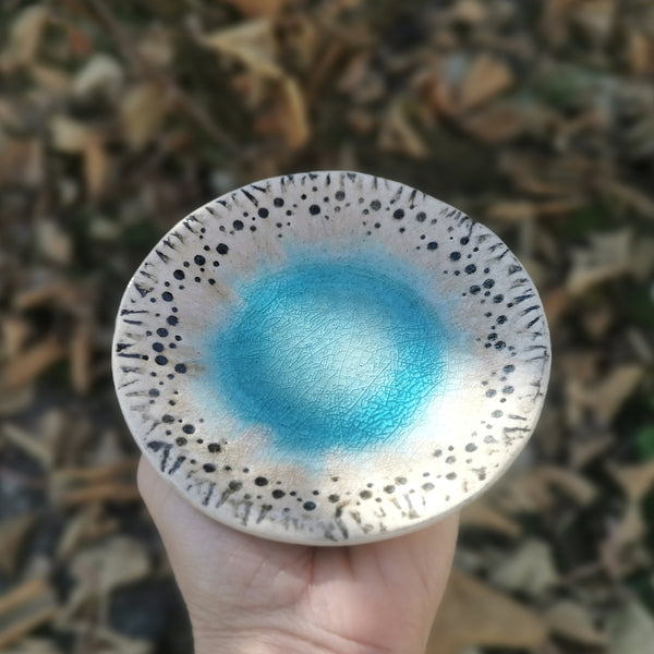 Turquoise ceramic bowl with beautiful cracked glaze