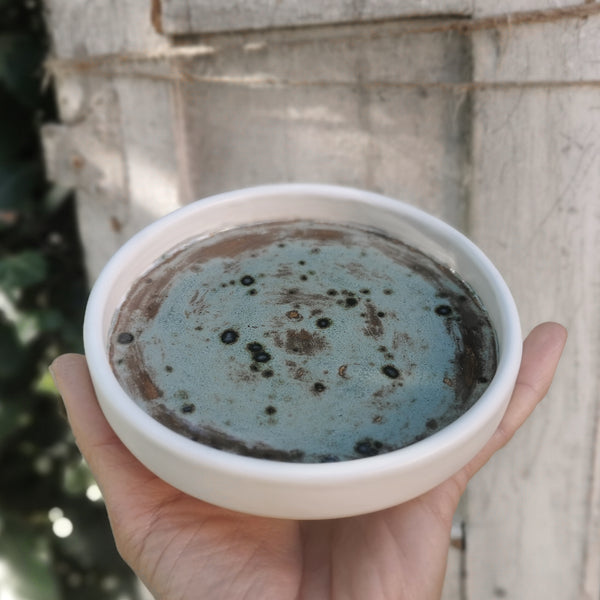 Set da bagno in ceramica effetto pietra.