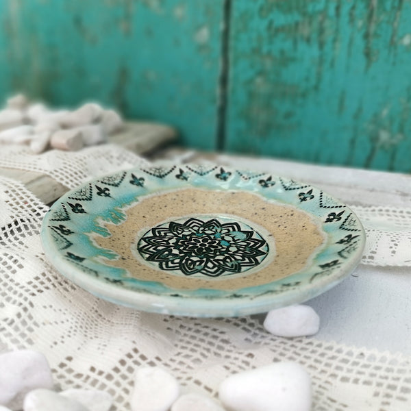 Honey brown and turquoise ceramic bowl with mandala pattern