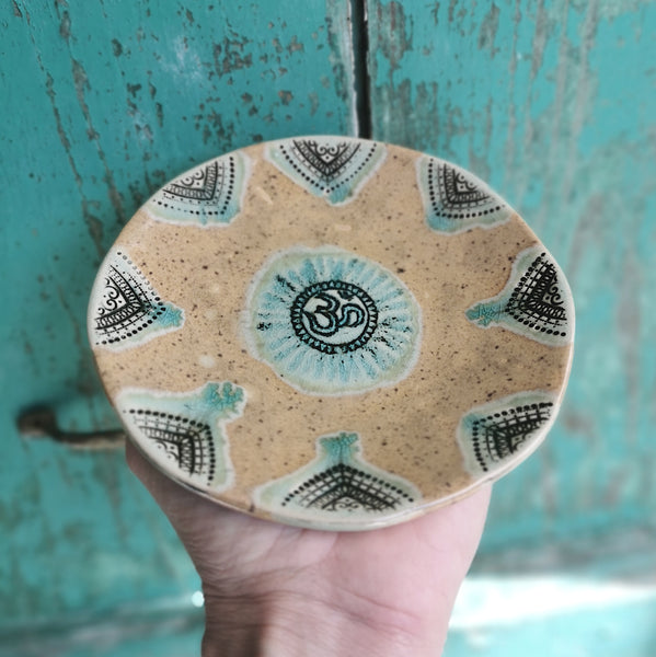 Honey brown ceramic bowl with ohm symbol