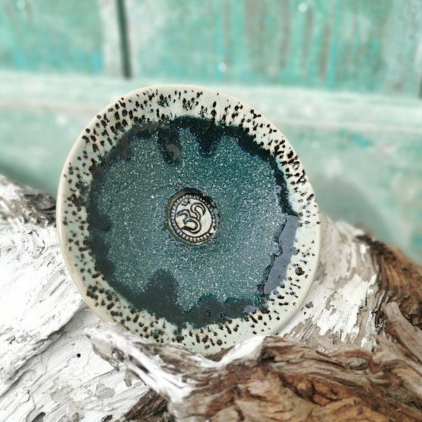 Sparkling green ceramic bowl with ohm sign