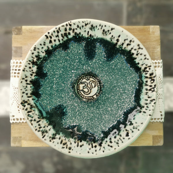 Sparkling green ceramic bowl with ohm sign