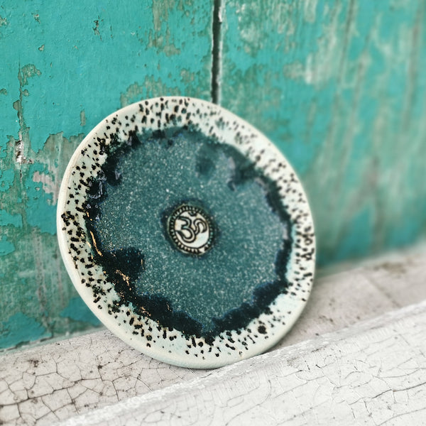 Sparkling green ceramic bowl with ohm sign