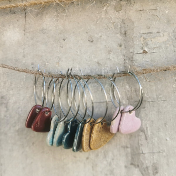 Handmade colorful hearts in burgundy color